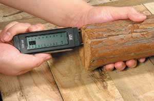 Use a damp meter to test for damp on internal walls