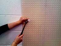 Mesh Membrane with plug being hammered.
